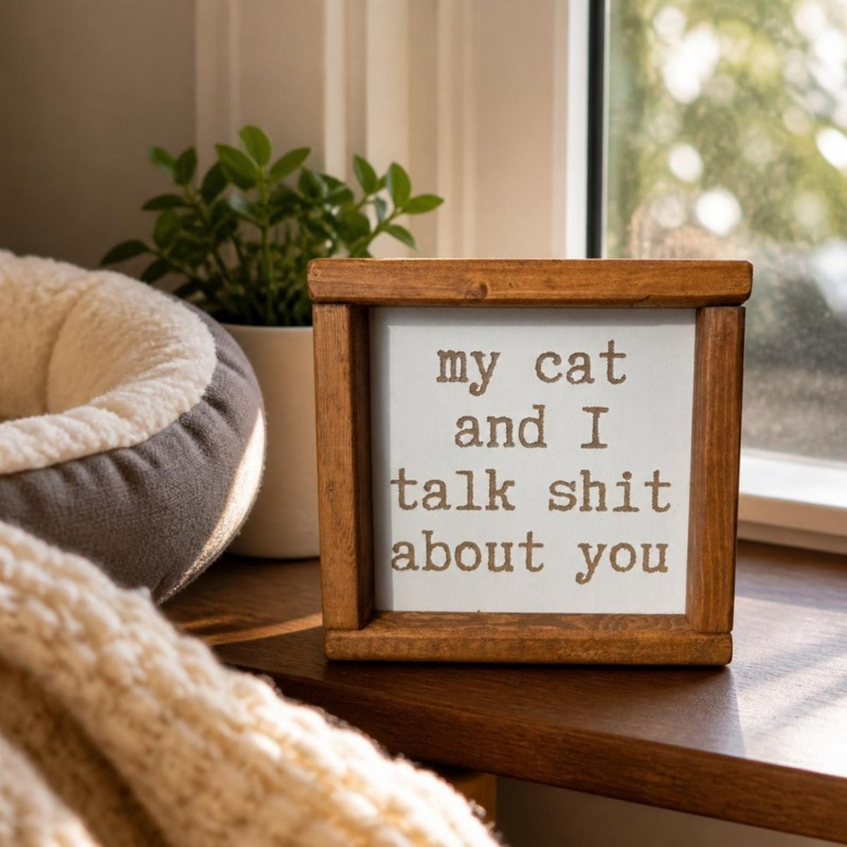 My cat and I talk shit about you framed sign on a windowsill
