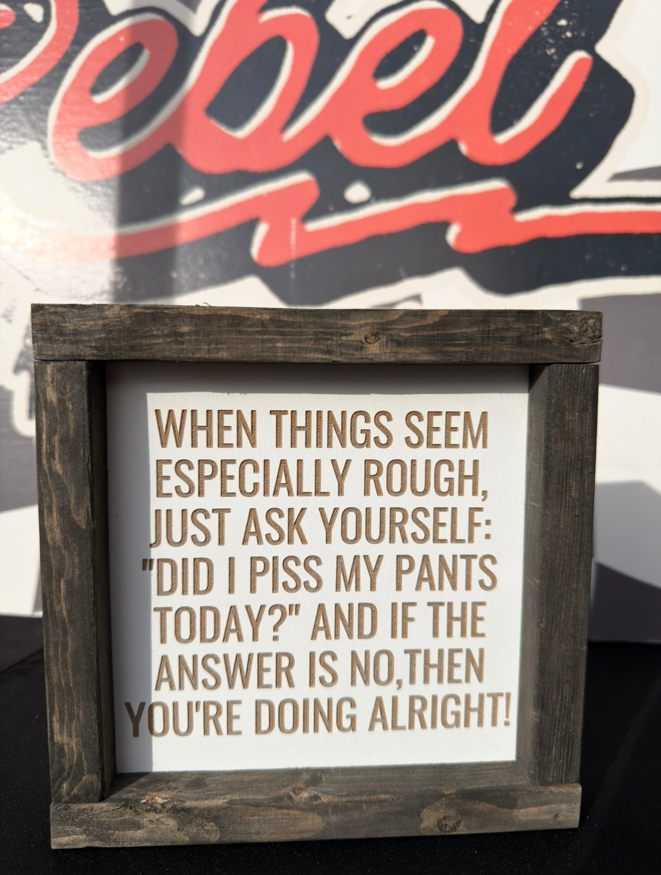When things seem especially rough framed sign