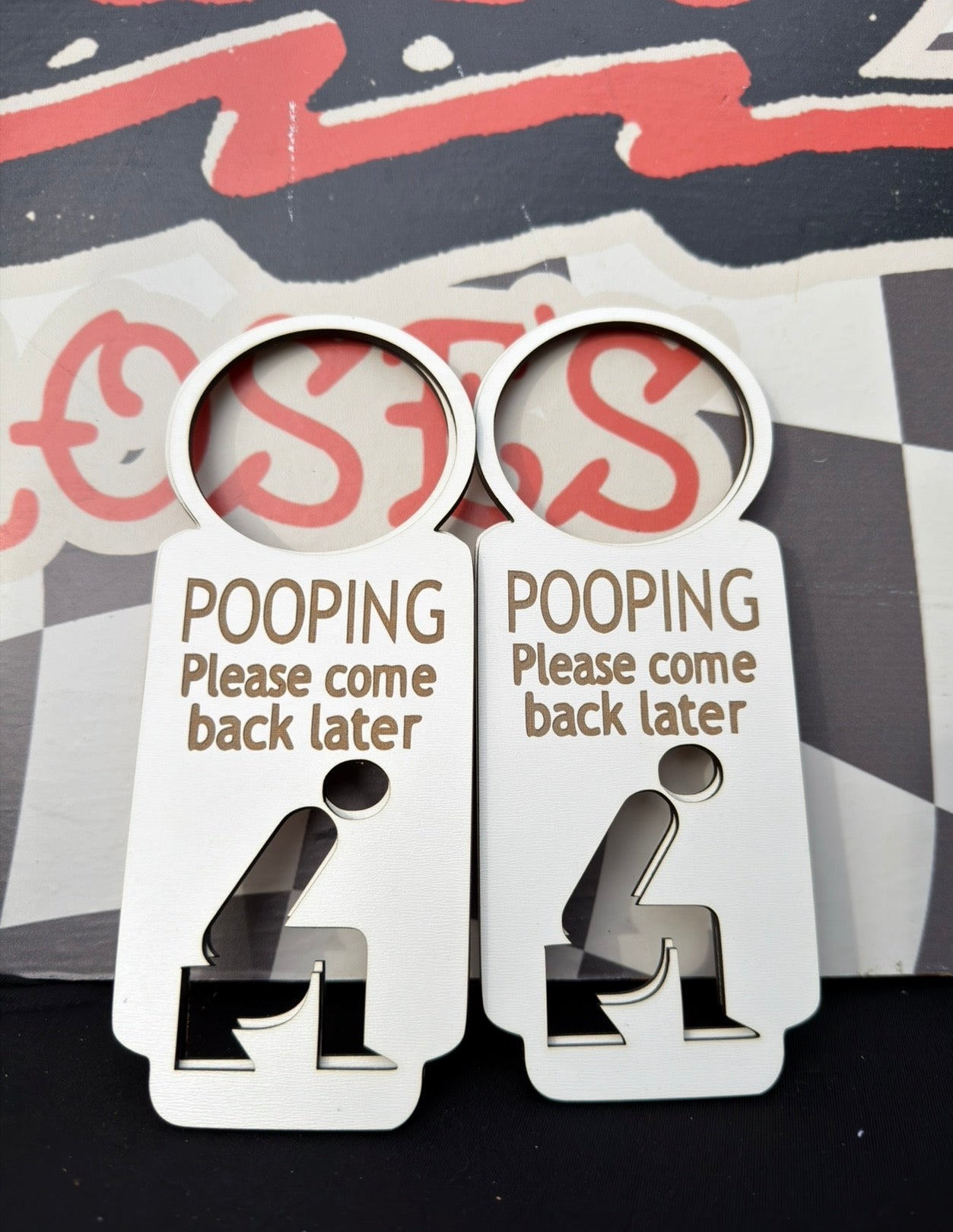 Pooping door knob hanger